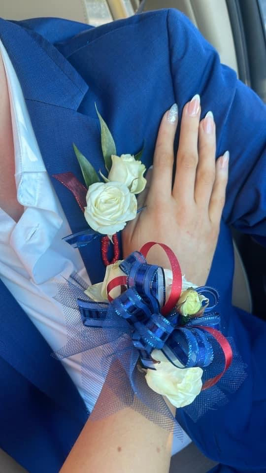 Prom Wrist Corsage green, hot pink, orange, pink, purple, red, white, yellow flower arrangement | Hensley, AR | East End Flowers And Gifts Inc Prom Wrist Corsage green, hot pink, orange, pink, purple, red, white, yellow flower arrangement | Hensley, AR | East End Flowers And Gifts Inc